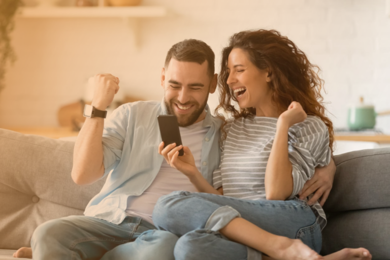 excited couple who has won the lottery